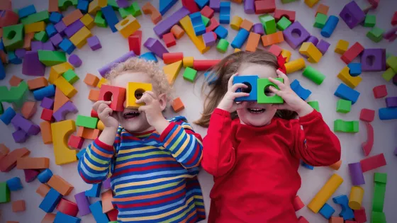 Children playing with building blocks